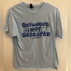 Austin PBS “Defunded Not Defeated” t shirt